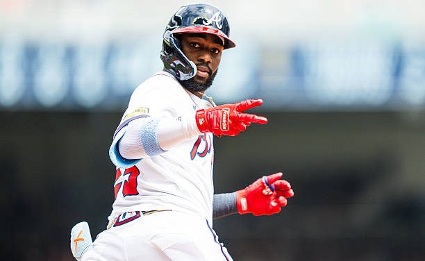 Michael Harris II celebrates after hitting a 7th inning, 3-run homer against The Marlins on Saturday. The Braves won the game, 7-1.
