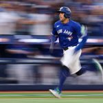 George Springer went 0-4 with a walk, but still managed to score a run in Toronto’s 10-1 dismantling of the Yankees in Game 1 of the ALDS.